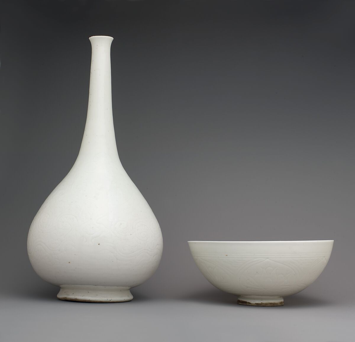 Bowl with Incised Lotus Flowers, Stonepaste; incised under transparent glaze (Gombroon ware)