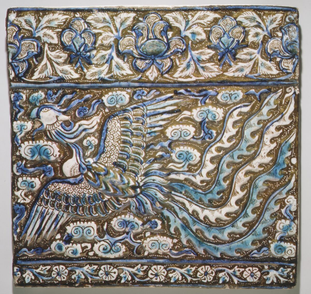 Tile with Image of Phoenix, Stonepaste; modeled, underglaze painted in blue and turquoise, luster-painted on opaque white ground