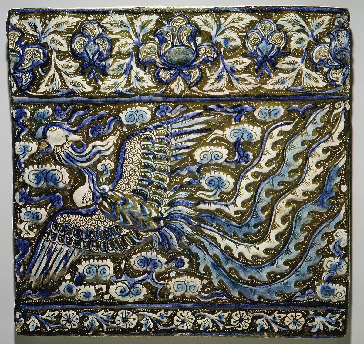 Tile with Image of Phoenix, Stonepaste; modeled, underglaze painted in blue and turquoise, luster-painted on opaque white ground