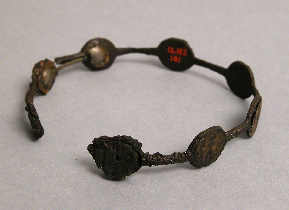 Bracelet, Iron; inlaid with bronze disks