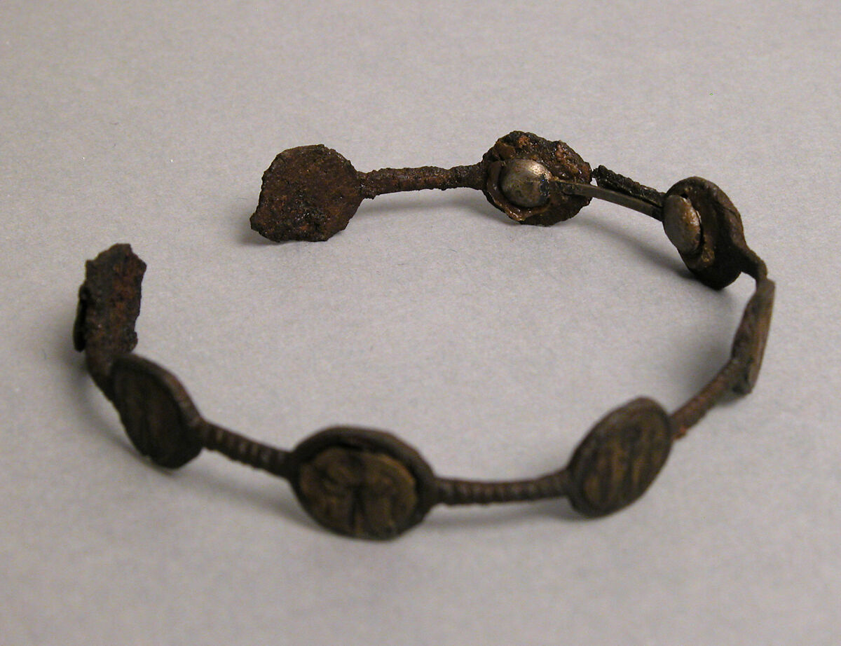 Bracelet, Iron; inlaid with bronze disks