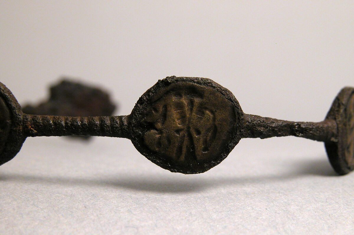 Bracelet, Iron; inlaid with bronze disks