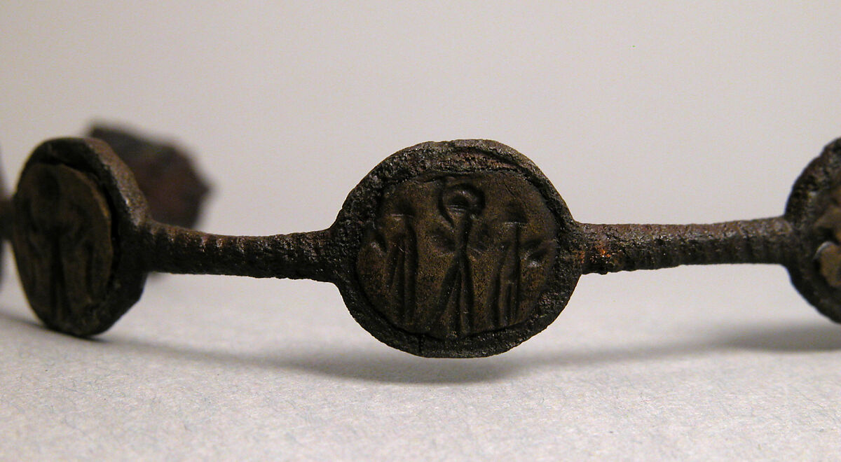 Bracelet, Iron; inlaid with bronze disks