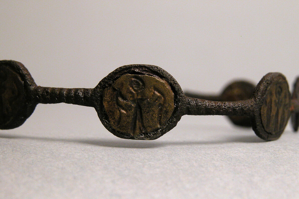 Bracelet, Iron; inlaid with bronze disks