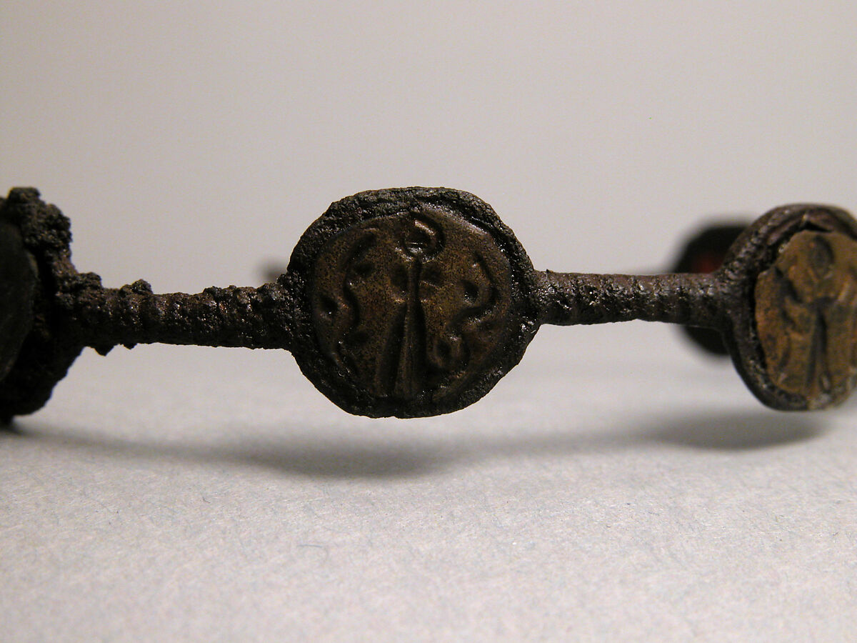 Bracelet, Iron; inlaid with bronze disks