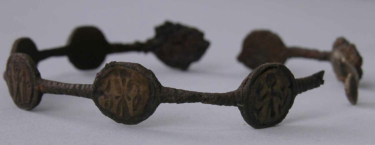 Bracelet, Iron; inlaid with bronze disks