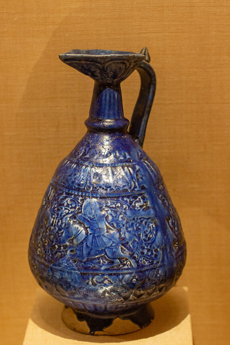 Ewer with Molded Inscriptions and Figures on Horseback, Stonepaste; molded, monochrome glazed 