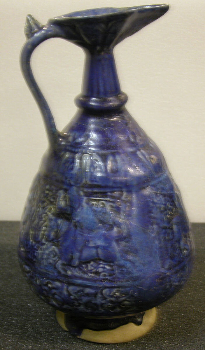 Ewer with Molded Inscriptions and Figures on Horseback, Stonepaste; molded, monochrome glazed