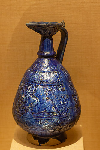Ewer with Molded Inscriptions and Figures on Horseback