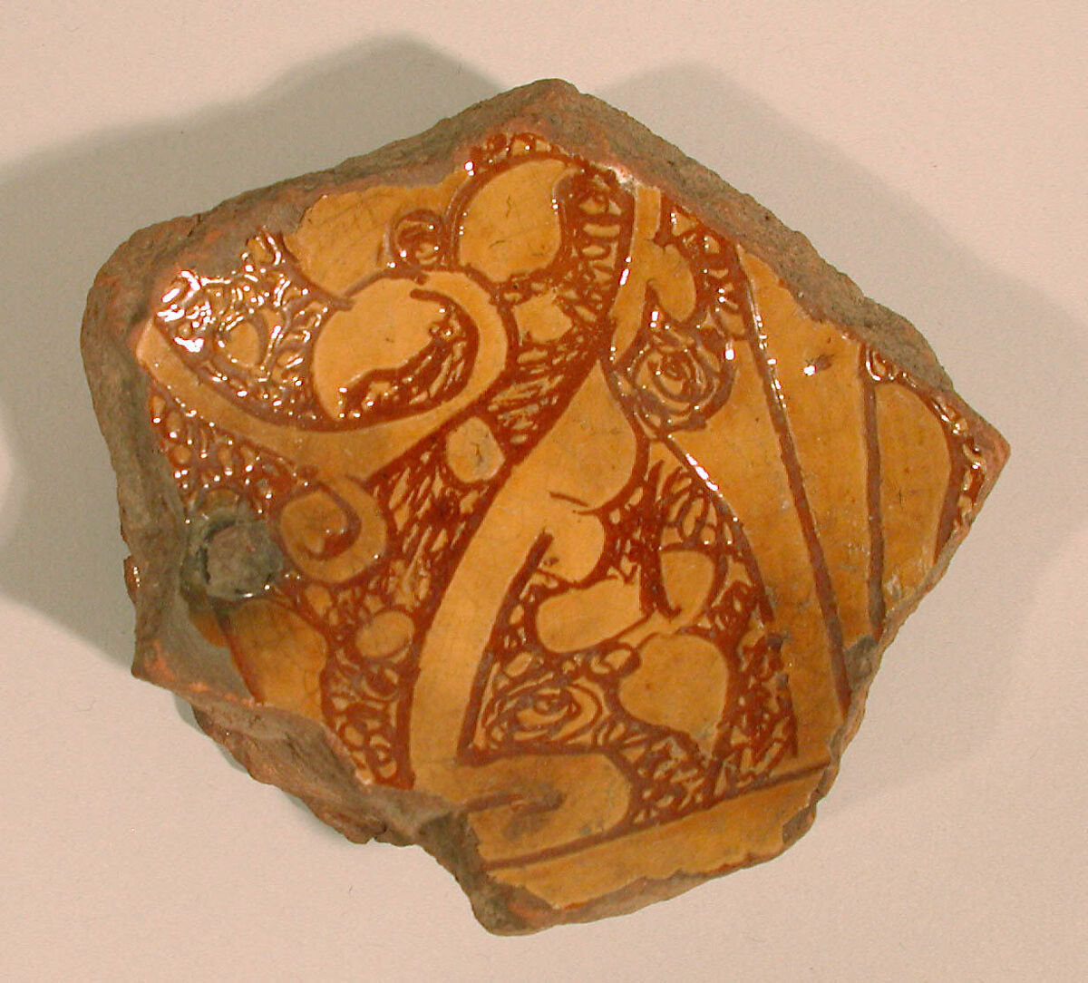 Ceramic Fragment, Earthenware; incised decoration through a white slip and coloring under transparent glaze
