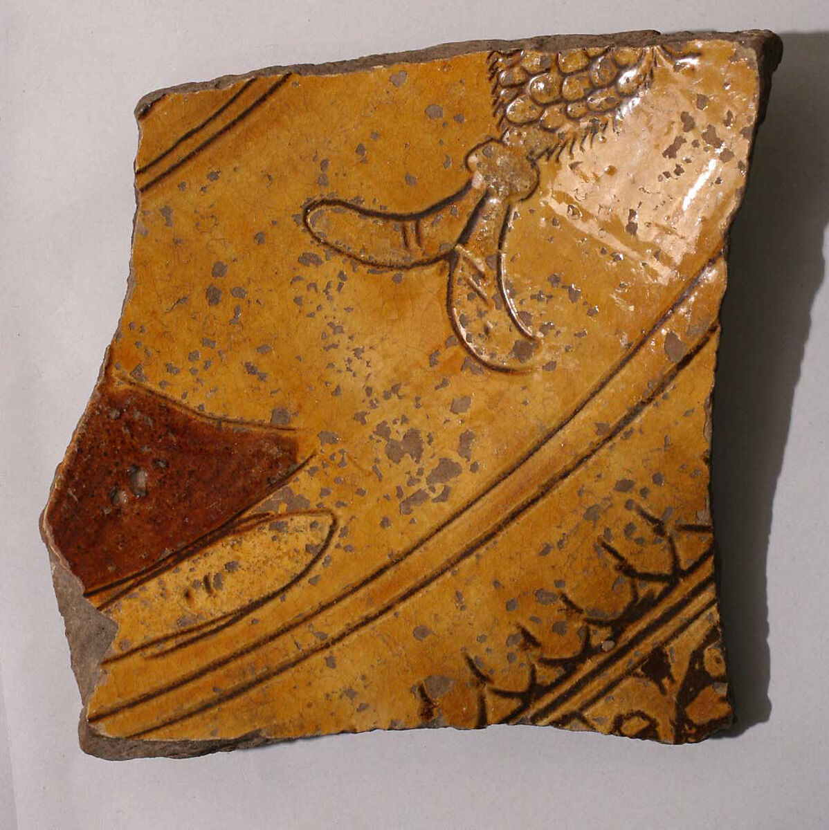 Ceramic Fragment, Earthenware; incised decoration through white slip and coloring under  transparent glaze 