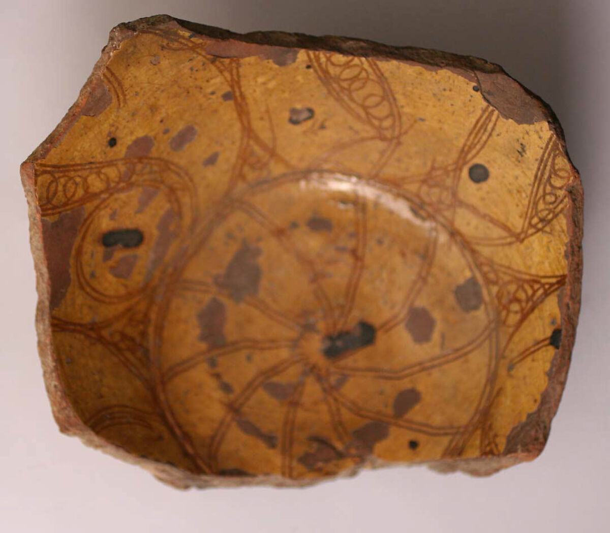 Ceramic Fragment, Earthenware; incised decoration through white slip and coloring under transparent glaze 
