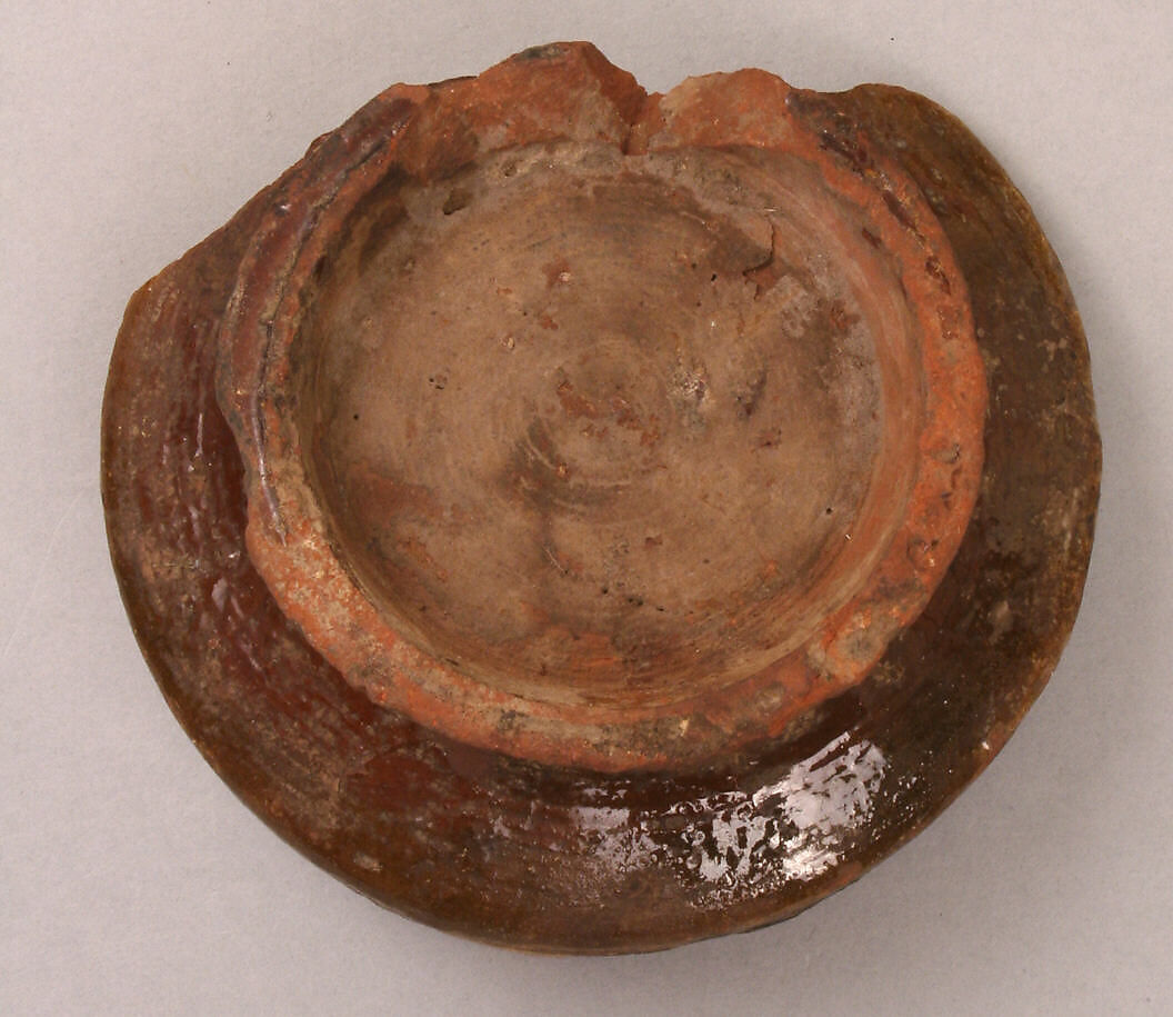 Fragment of a Bowl, Earthenware; incised decoration through white slip and coloring under transparent glaze