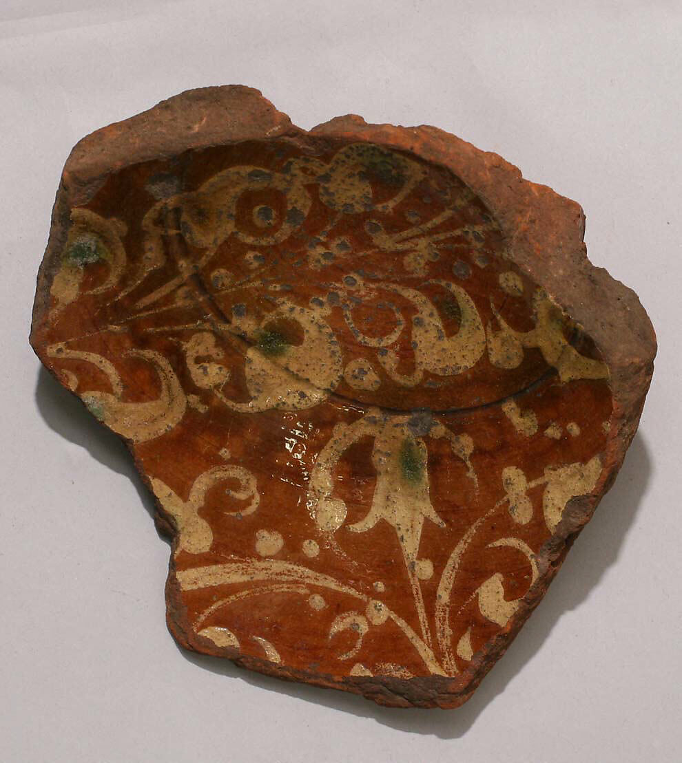 Fragment of a Bowl, Earthenware; slip-painted under transparent glaze 