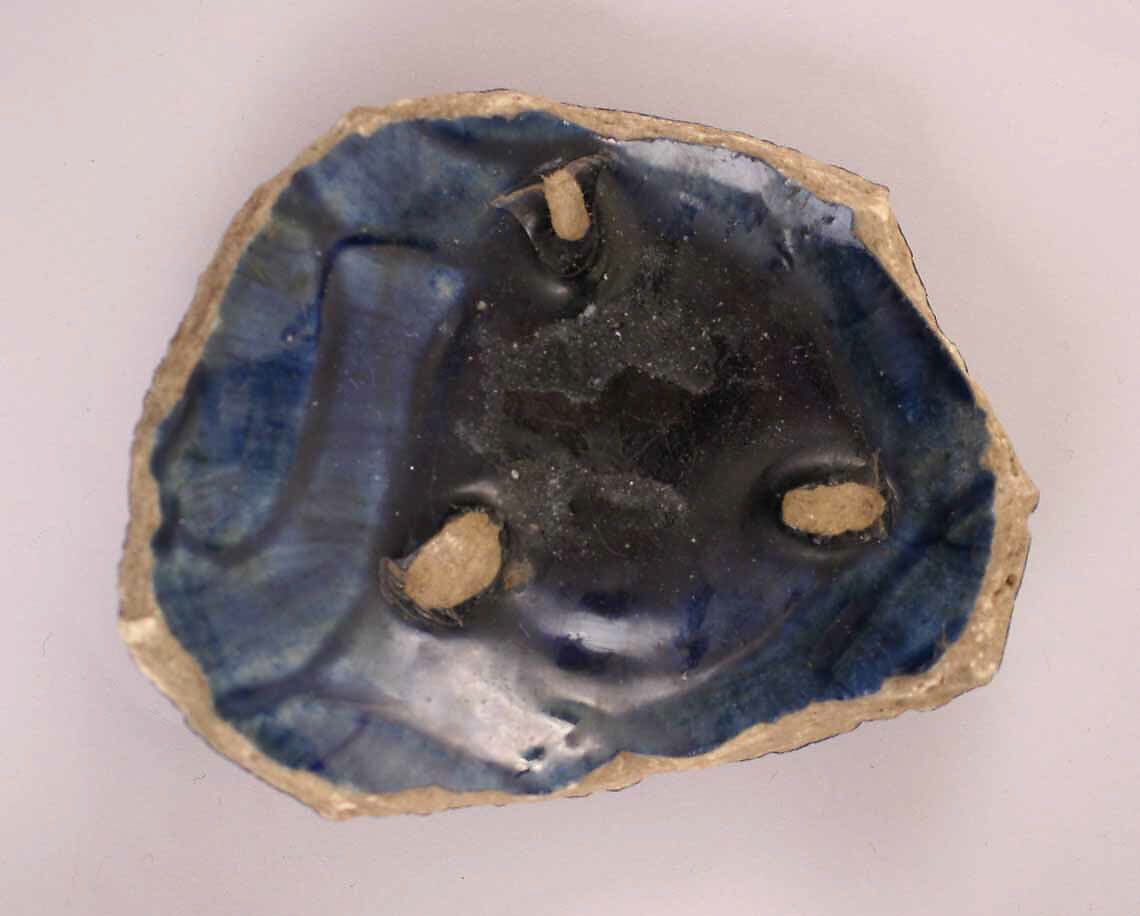 Ceramic Fragment, Earthenware; incised decoration under blue glaze 