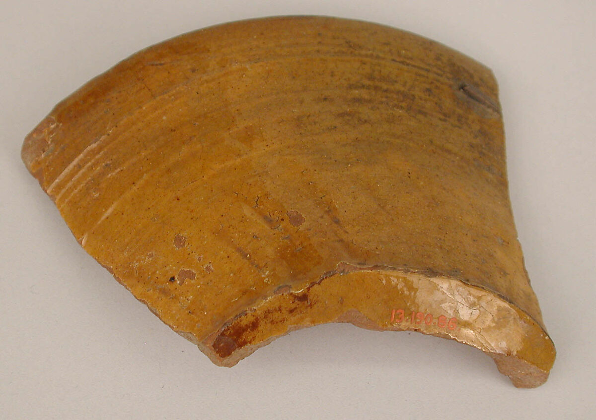 Fragment of a Bowl, Earthenware; incised decoration through white slip and coloring under transparent glaze