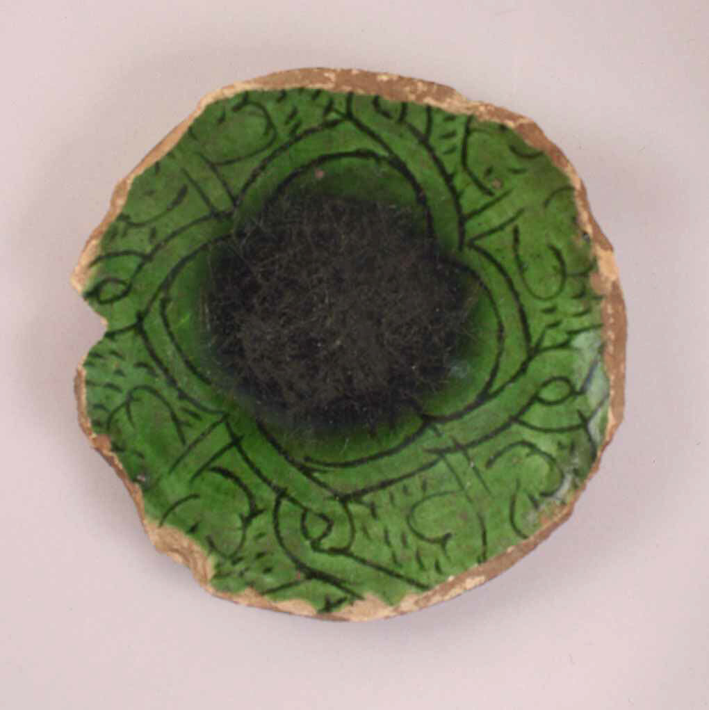 Fragment of a Dish, Earthenware; incised decoration under green glaze 