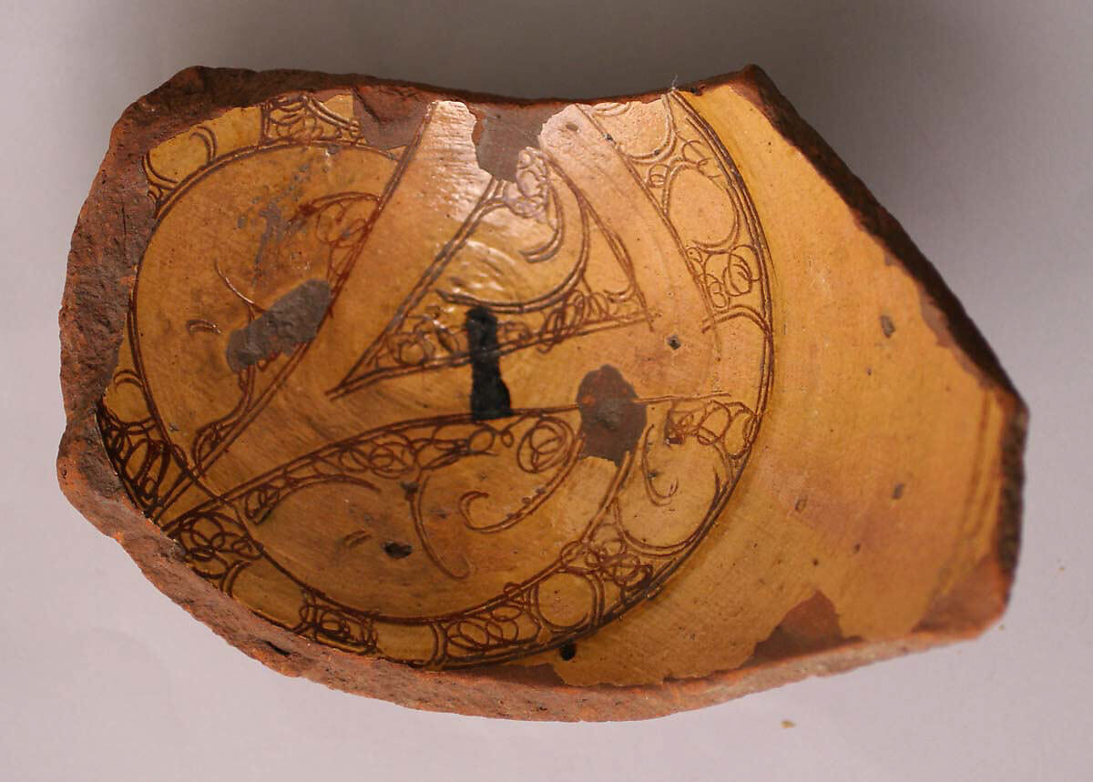 Fragment of a Bowl, Earthenware; incised decoration through white slip and coloring under transparent glaze. 