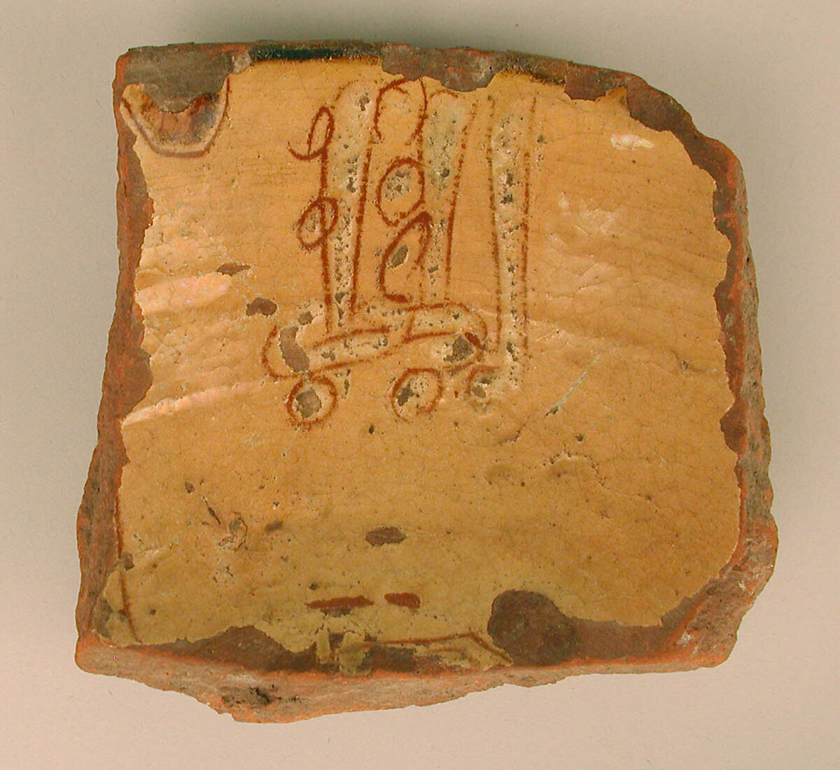 Ceramic Fragment, Earthenware; incised decoration through white slip and coloring under transparent glaze 