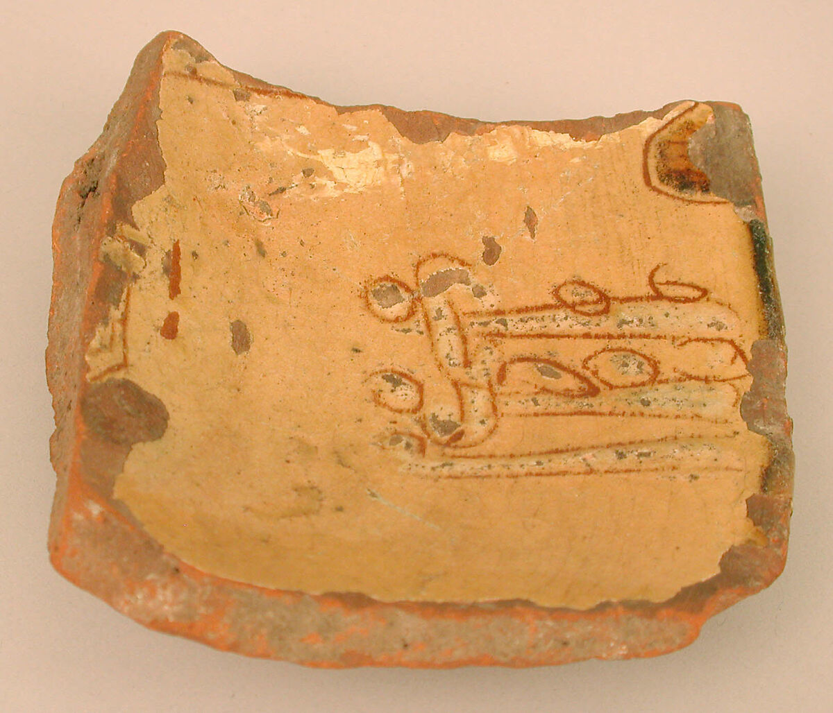 Ceramic Fragment, Earthenware; incised decoration through white slip and coloring under transparent glaze