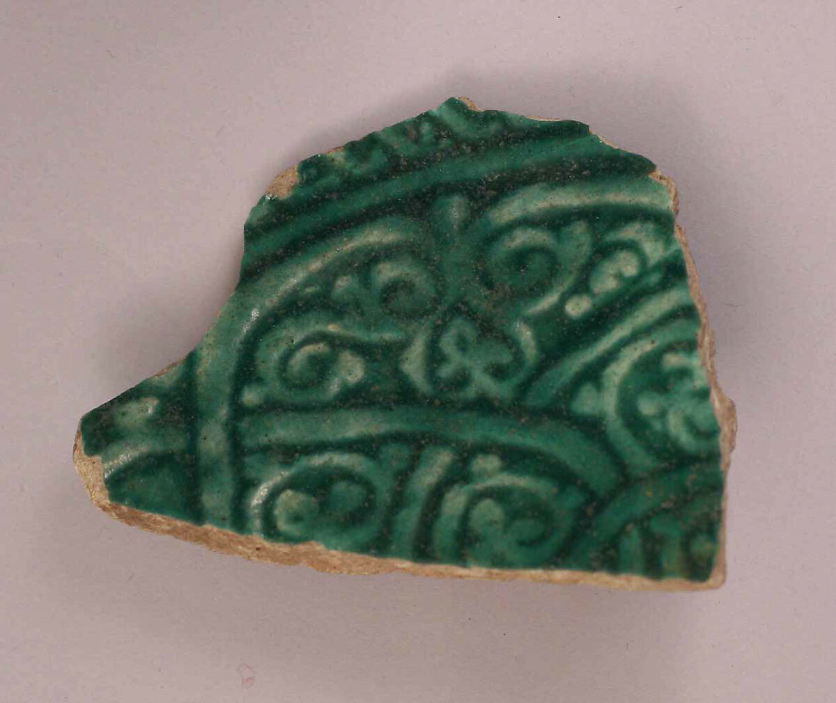 Fragment of a Dish, Stonepaste; incised, glazed 