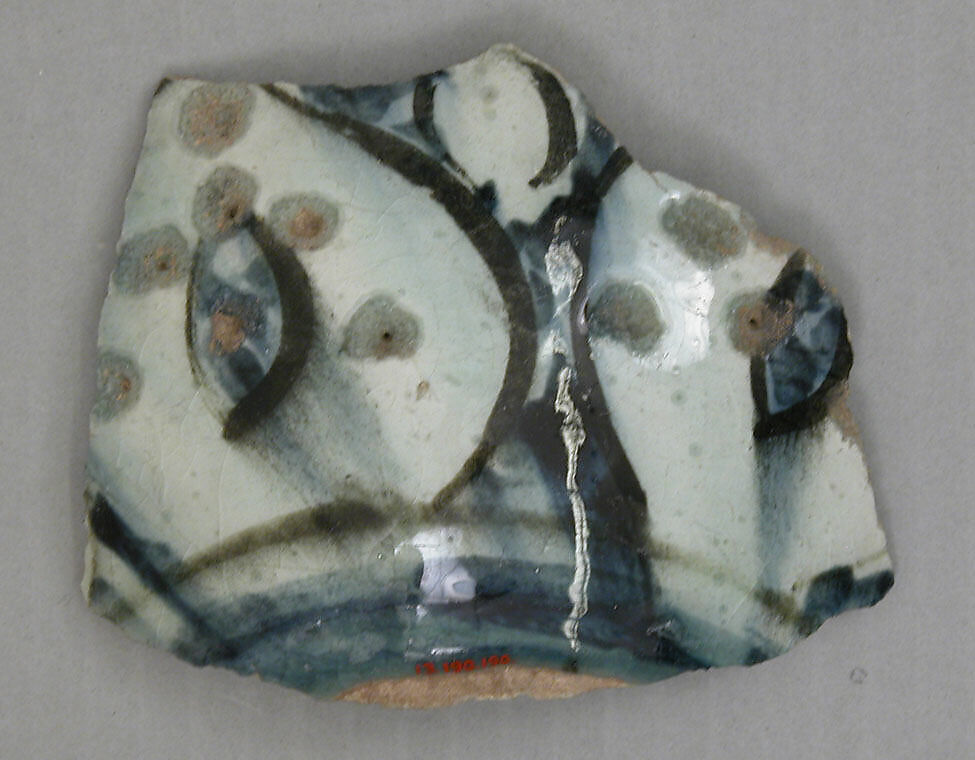 Fragment of Dish, Stonepaste; polychrome underglaze painted under colorless glaze 