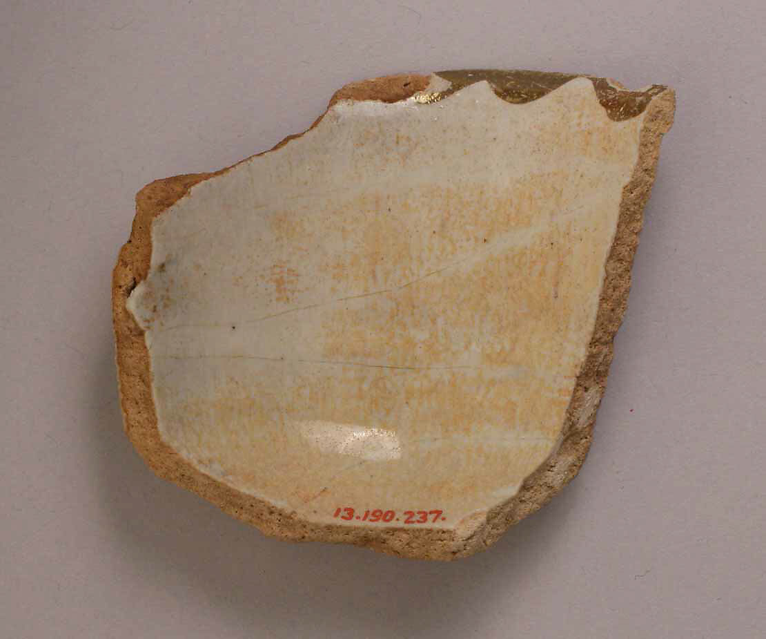 Fragment of Dish, Stonepaste; glazed and luster-painted