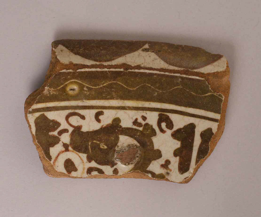 Fragment of a Dish, Earthenware; luster-painted 
