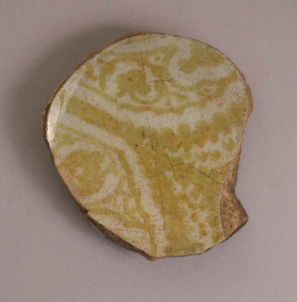 Fragment of Dish, Stonepaste; glazed and luster-painted 