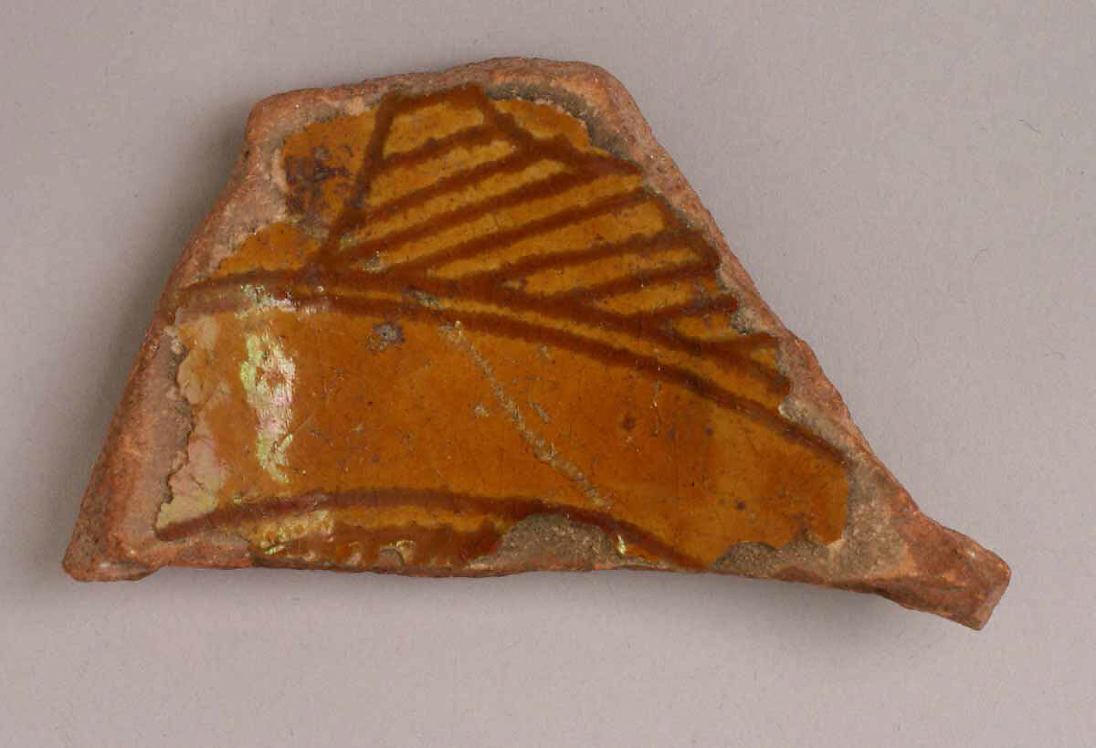 Fragment of a Bowl, Earthenware; incised decoration through white slip and coloring under transparent glaze