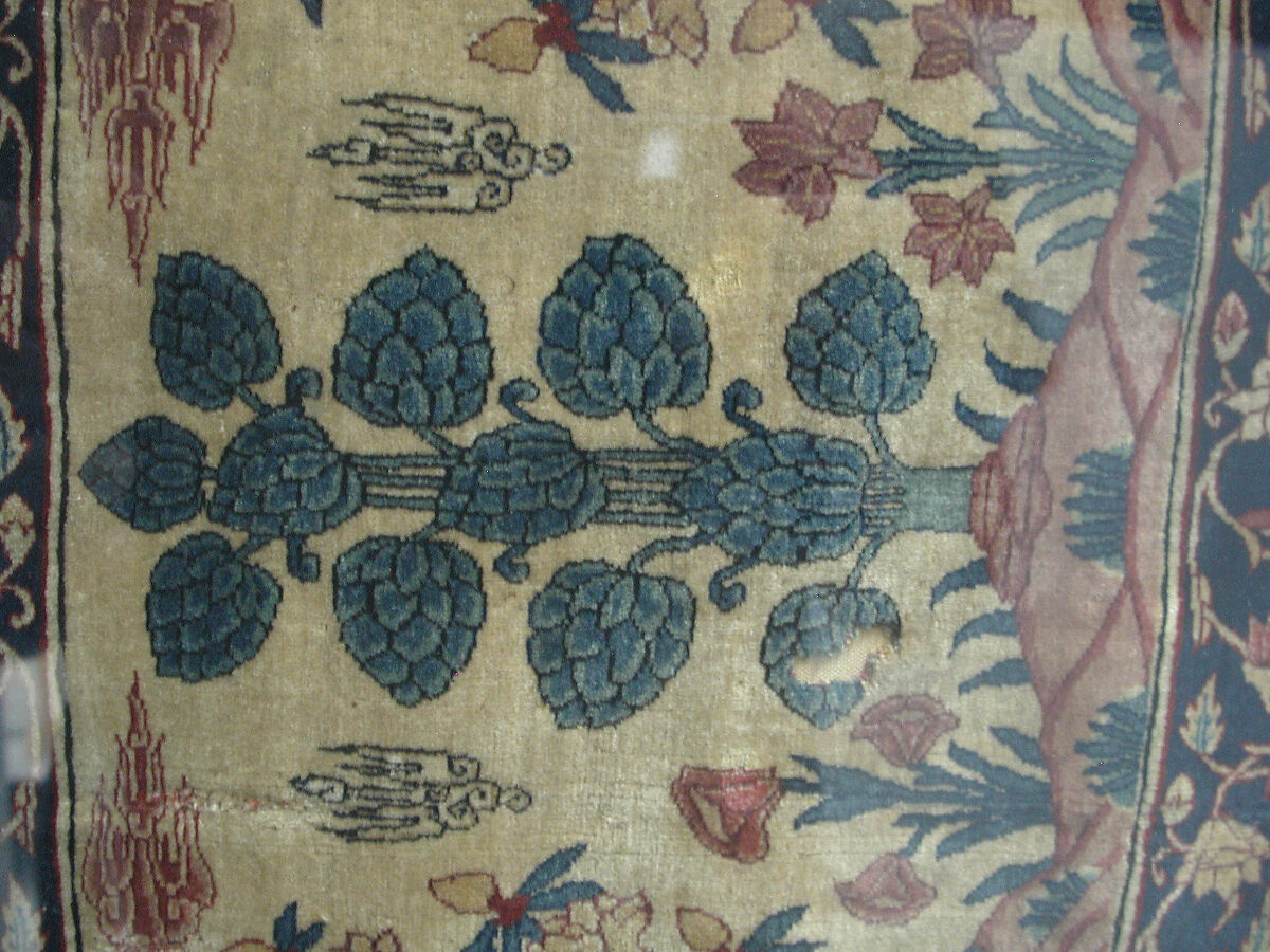 Fragments of a Carpet with Lattice and Blossom Pattern, Silk (warp and weft), pashmina wool (pile); asymmetrically knotted pile