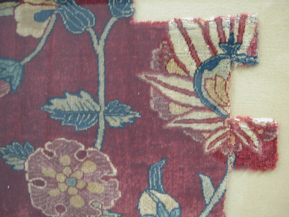 Fragments of a Carpet with Lattice and Blossom Pattern, Silk (warp and weft), pashmina wool (pile); asymmetrically knotted pile
