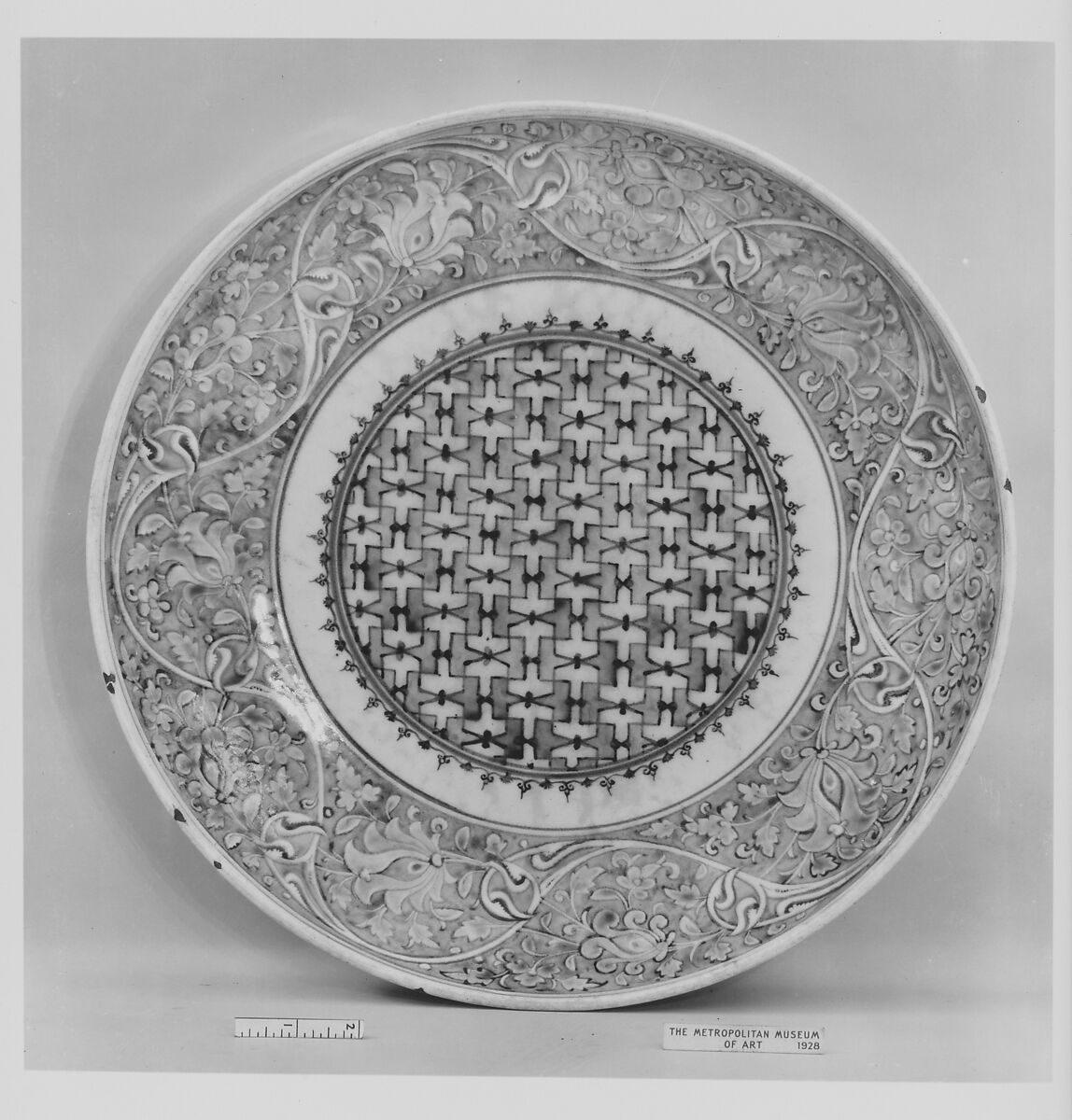 Dish, Stonepaste; painted in turquoise and two hues of blue under transparent glaze