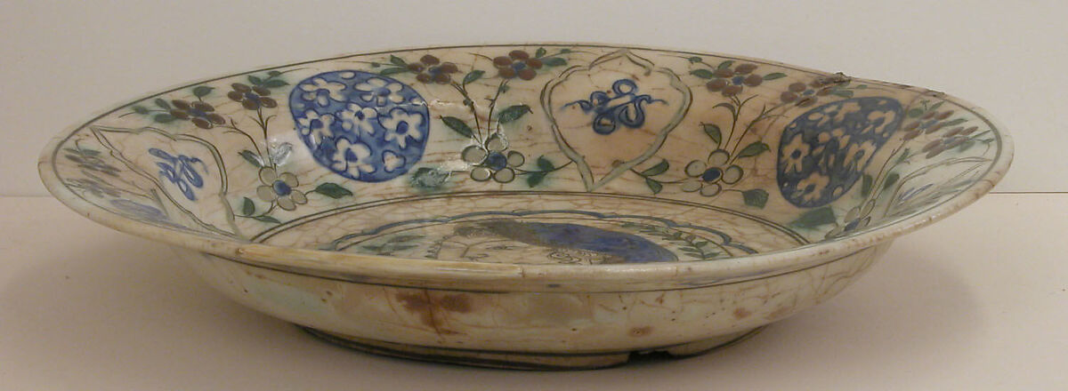 Dish Depicting a Woman Bust and Floral Decoration, Stonepaste; polychrome painted under transparent glaze