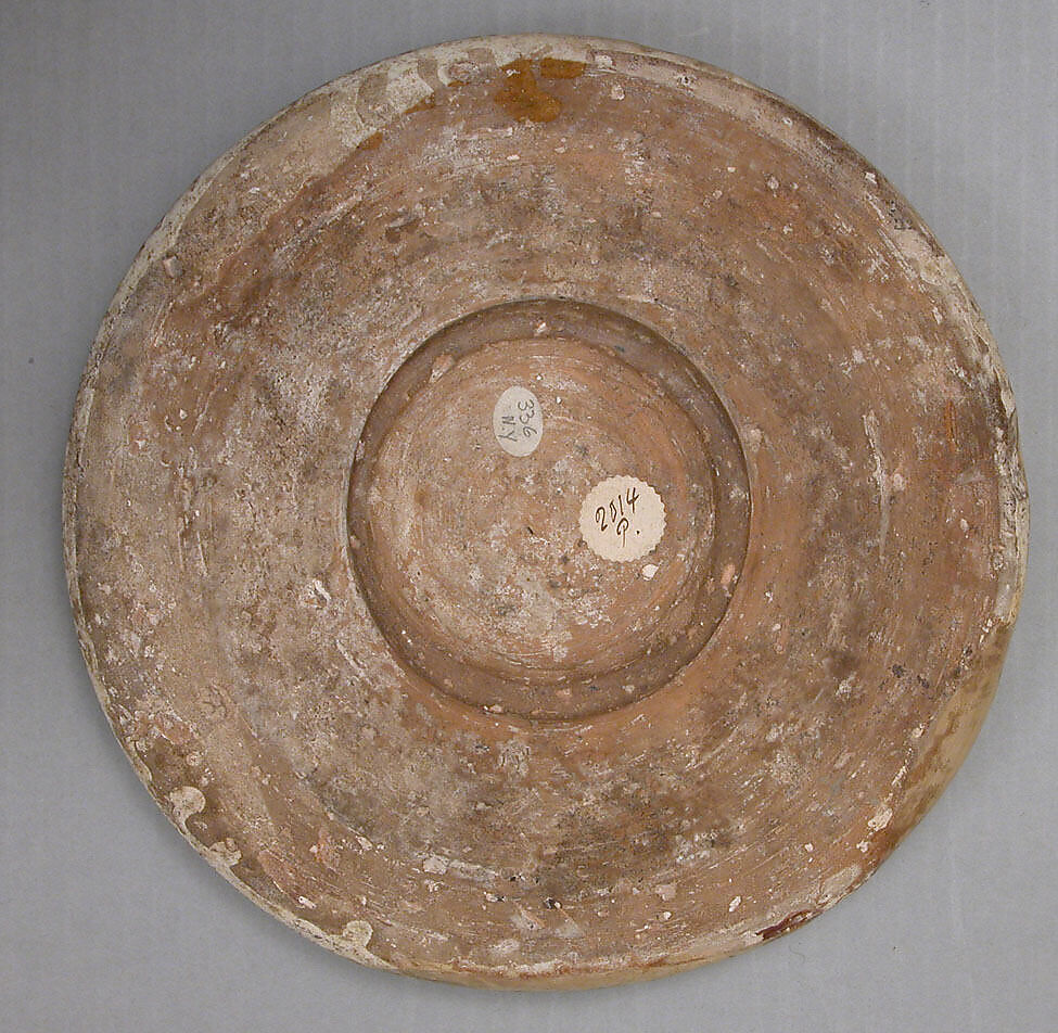 Dish with a Horseman and Trained Cheetah, Earthenware; slipped and carved under transparent colorless-brown glaze