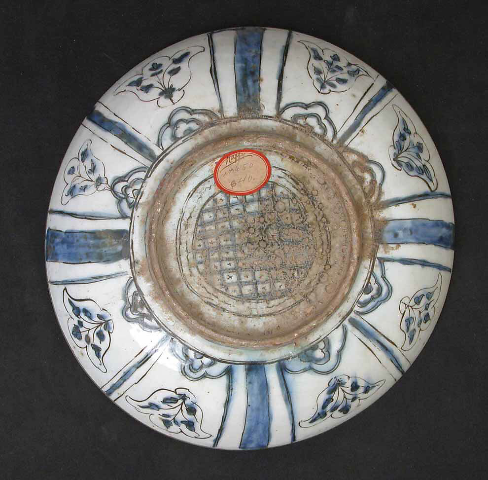 Bowl with Pagodas and Landscape Elements, Stonepaste; painted under transparent glaze