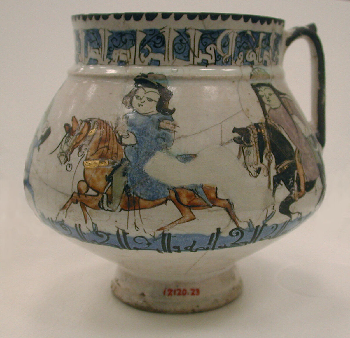 Ewer with Horsemen Inscribed in Arabic with Good Wishes to its Owner, Stonepaste; polychrome inglaze and overglaze painted on opaque monochrome glaze (mina'i)