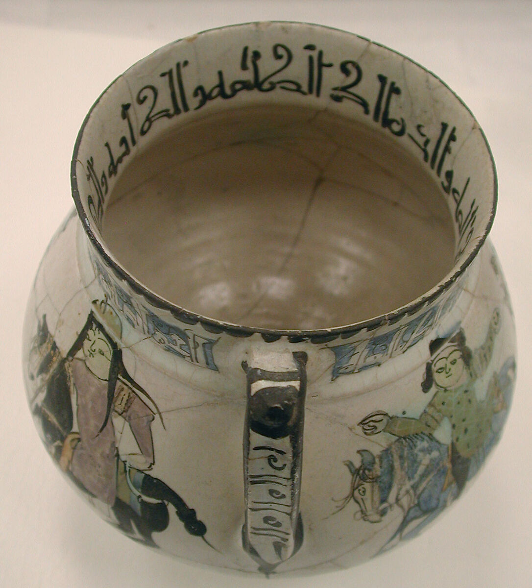 Ewer with Horsemen Inscribed in Arabic with Good Wishes to its Owner, Stonepaste; polychrome inglaze and overglaze painted on opaque monochrome glaze (mina'i)