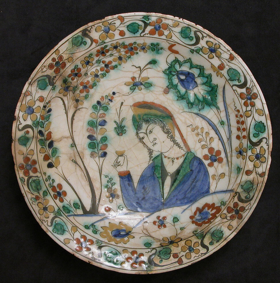 Dish, Stonepaste; underglaze painted in black, blue, and green with red and yellow slips 