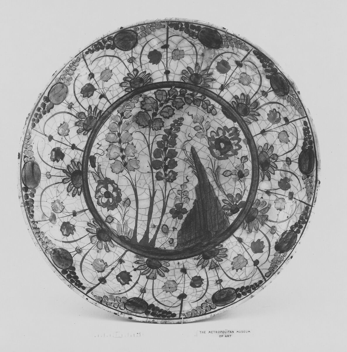 Dish, Stonepaste; underglaze painted in black, blue, and green with red and yellow slips