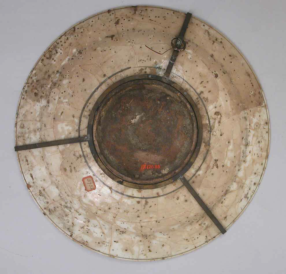 Dish, Stonepaste; underglaze painted in black, blue, and green with red and yellow slips