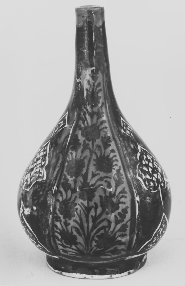 Bottle, Stonepaste; luster-painted on opaque white and blue glaze under transparent colorless glaze