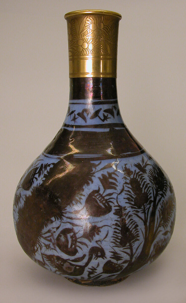 Bottle, Stonepaste; luster-painted on opaque blue glaze under transparent colorless glaze; gilt copper 