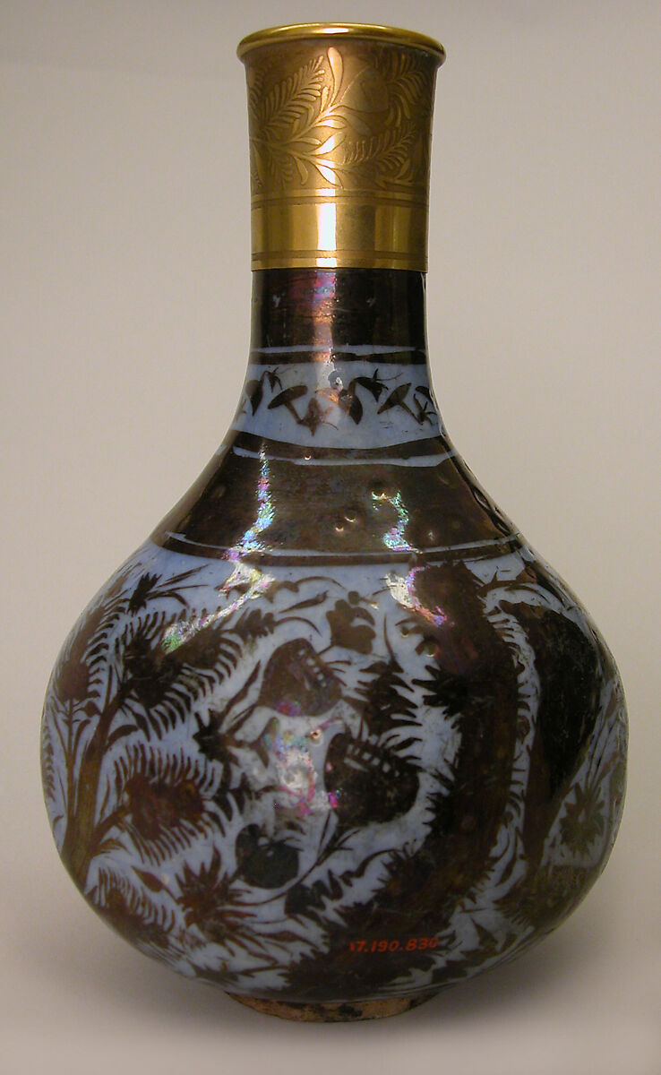 Bottle, Stonepaste; luster-painted on opaque blue glaze under transparent colorless glaze; gilt copper
