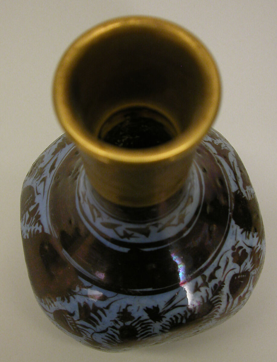 Bottle, Stonepaste; luster-painted on opaque blue glaze under transparent colorless glaze; gilt copper