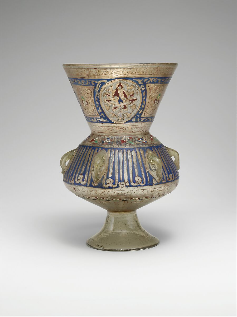 Mosque lamp, Glass, colorless with brownish tinge; free blown; enameled with red, blue, white, yellow, and green; gilded; six loops for suspension and foot attached.