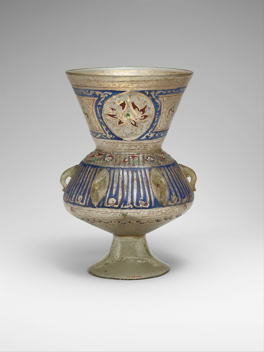Mosque lamp, Glass, colorless with brownish tinge; free blown; enameled with red, blue, white, yellow, and green; gilded; six loops for suspension and foot attached.