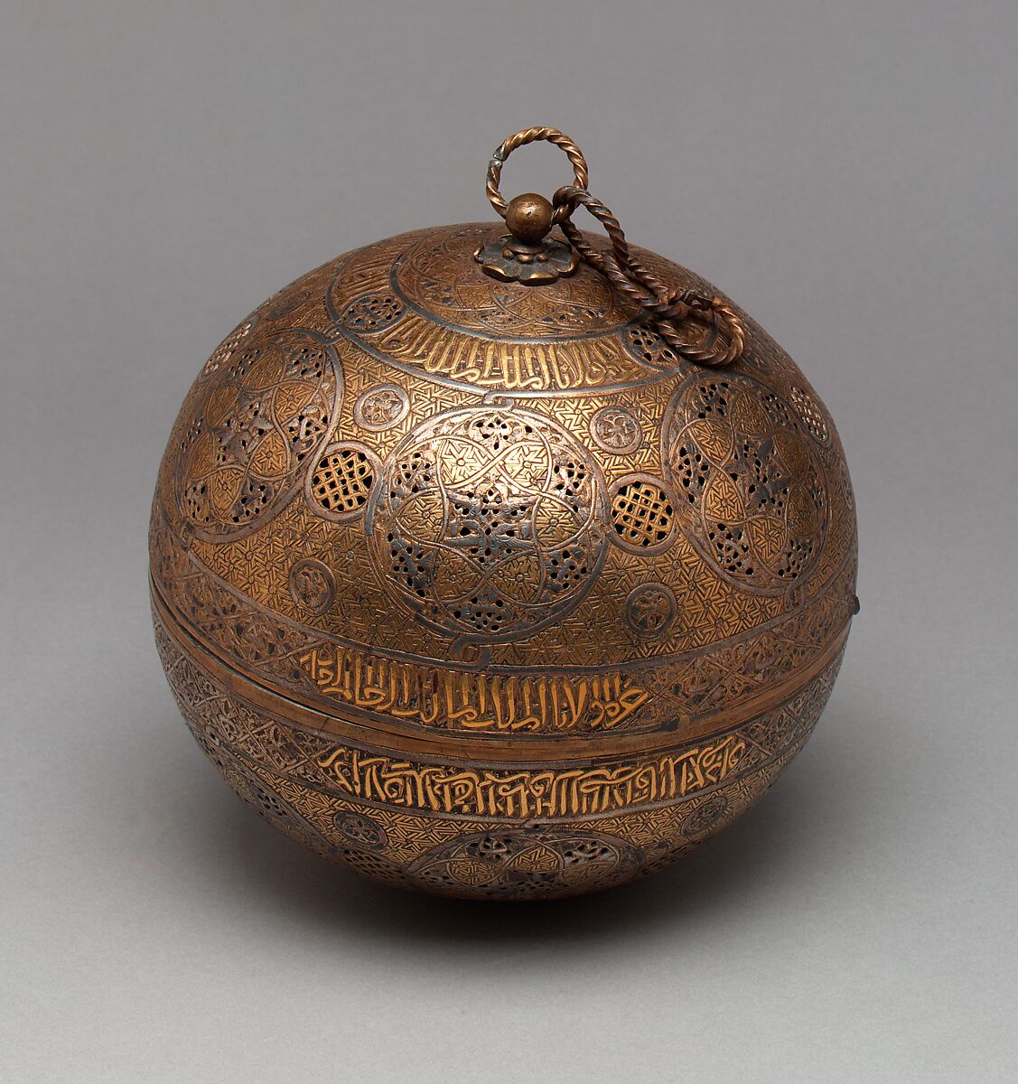 Pierced Globe, Brass; spun and turned, pierced, chased, inlaid with gold, silver, and black compound 