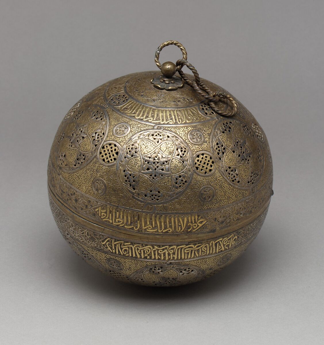 Pierced Globe, Brass; spun and turned, pierced, chased, inlaid with gold, silver, and black compound