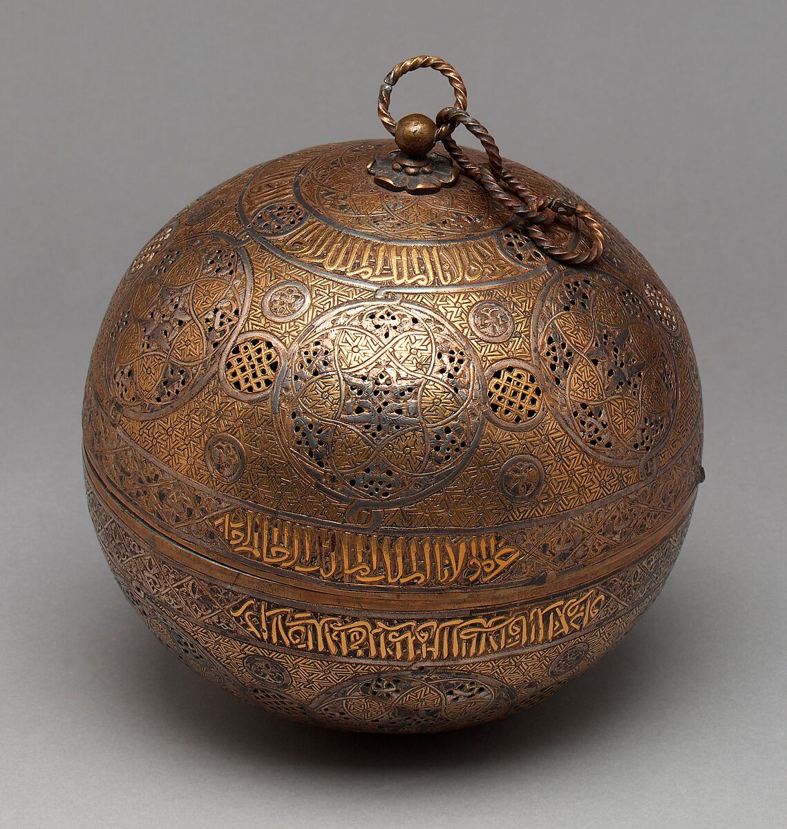 Pierced Globe, Brass; spun and turned, pierced, chased, inlaid with gold, silver, and black compound